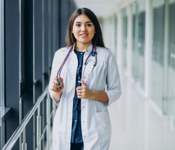 young-woman-doctor-with-stethoscope-hospital_1303-20691 young-woman-doctor-with-stethoscope-hospital_1303-20691